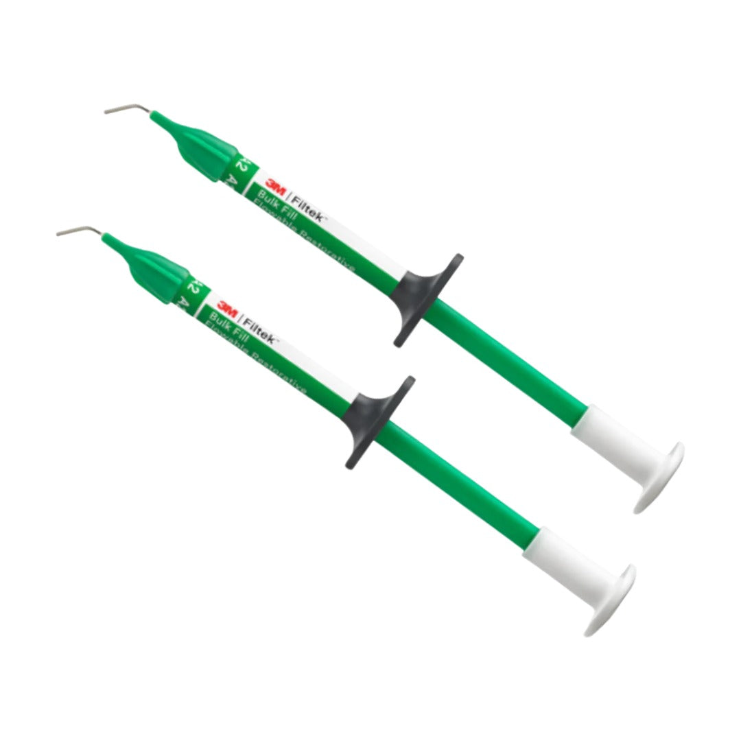 Two dental instruments with green handles and white tips on a white background