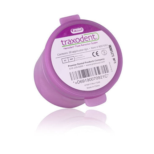 Purple container with 'traxodent' branding on a white background