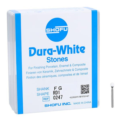 Box of Shofu Dura-White Stones with a small stone on a white background